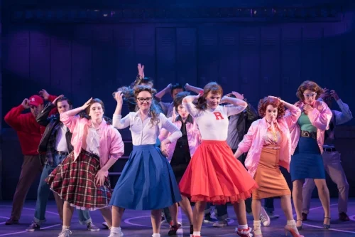   Photos by Michael DeCristofaro  The cast of “Grease” light up the stage in electrifying performance at Northport’s John W. Engeman Theater. 