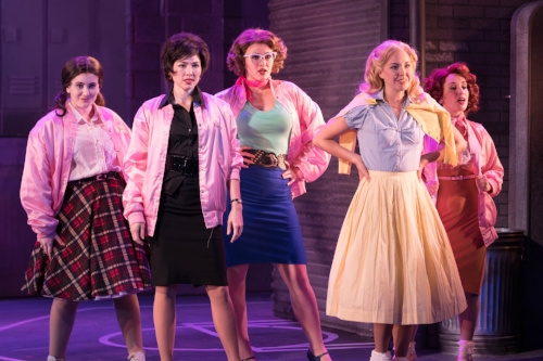  Hannah Slabaugh (as Jan), Madeleine Barker (as Rizzo), Laura Helm (as Marty), Liana Hunt (as Sandy) and Sari Alexander (as Frenchy) in the John W. Engeman Theater’s production of “Grease.” 