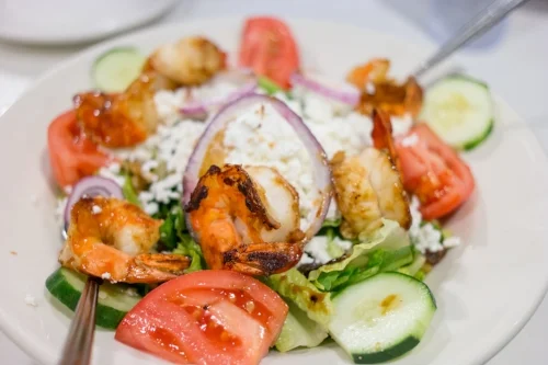  Grilled Shrimp Goat Cheese Mandarin Oranges Walnuts &amp; Raisins, served with mixed greens and a balsamic vinaigrette dressing, is a garden of sweet and savory flavors that make this salad a refreshing start to any meal. 