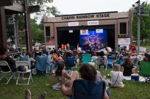  Right, musicians rock the Chapin Rainbow Stage at Heckscher Park on July 22 for the third annual Coltrane Day Music Festival. 