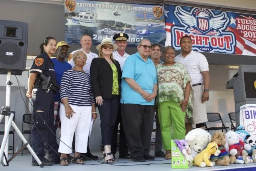   Long Islander News photo/Janee Law  Pictured, from left, are: Suffolk Police 2nd Precinct Liaison Officer Claudia Delgado; Rev. Larry Jennings, pastor of the Bethel A.M.E. Church and NAACP Huntington Branch president; Dolores Thompson; Suffolk Poli