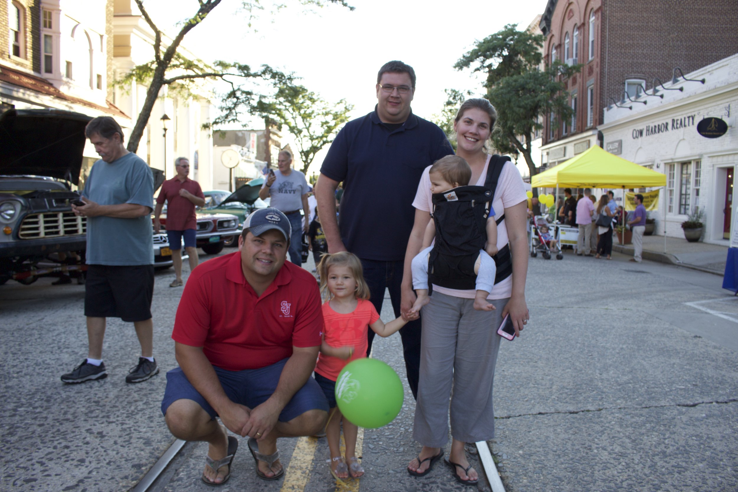  Steve, Kate, Danny, and Kristen Raszka (bottom) Kyle Schwartz (top) behind of Northport, take a stroll down Main Street in Northport Village.&nbsp; 