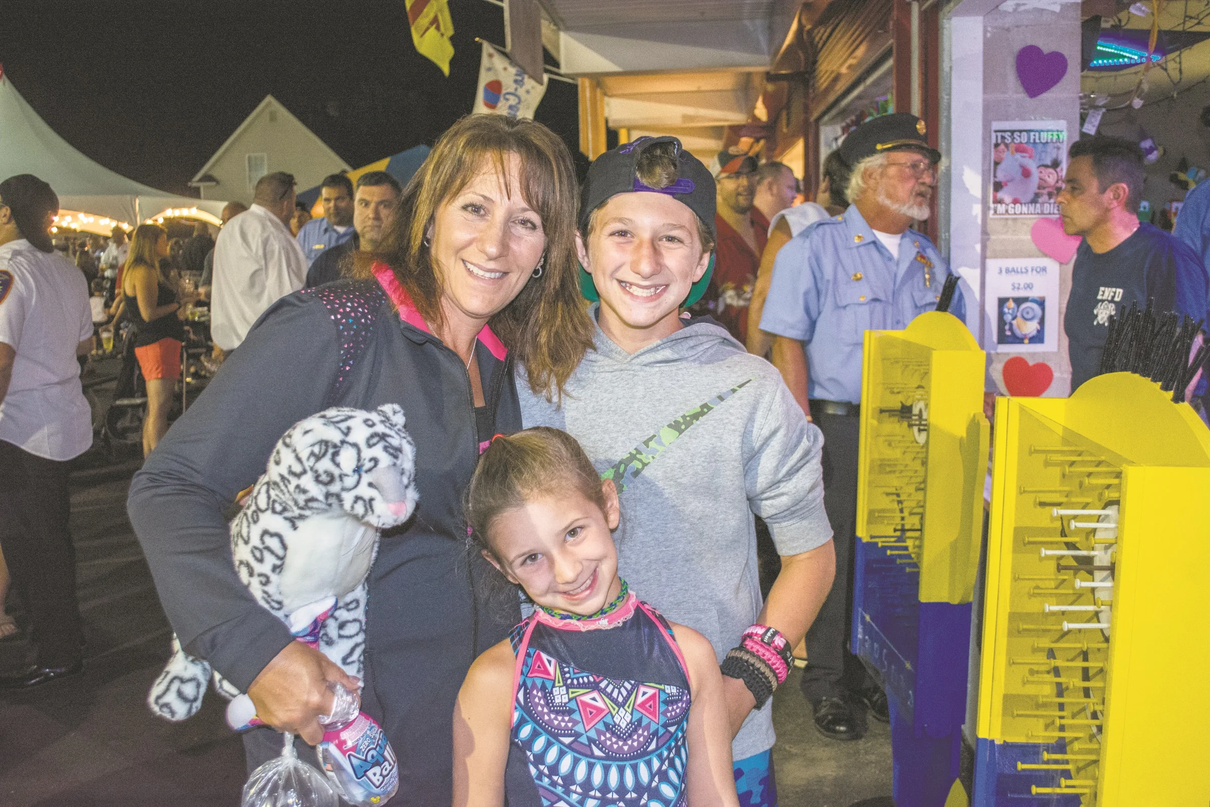  Christina McCarthy, left, of East Northport, Pictured with her kids, said she's been coming to the fair with her family for 21 years.&nbsp; 