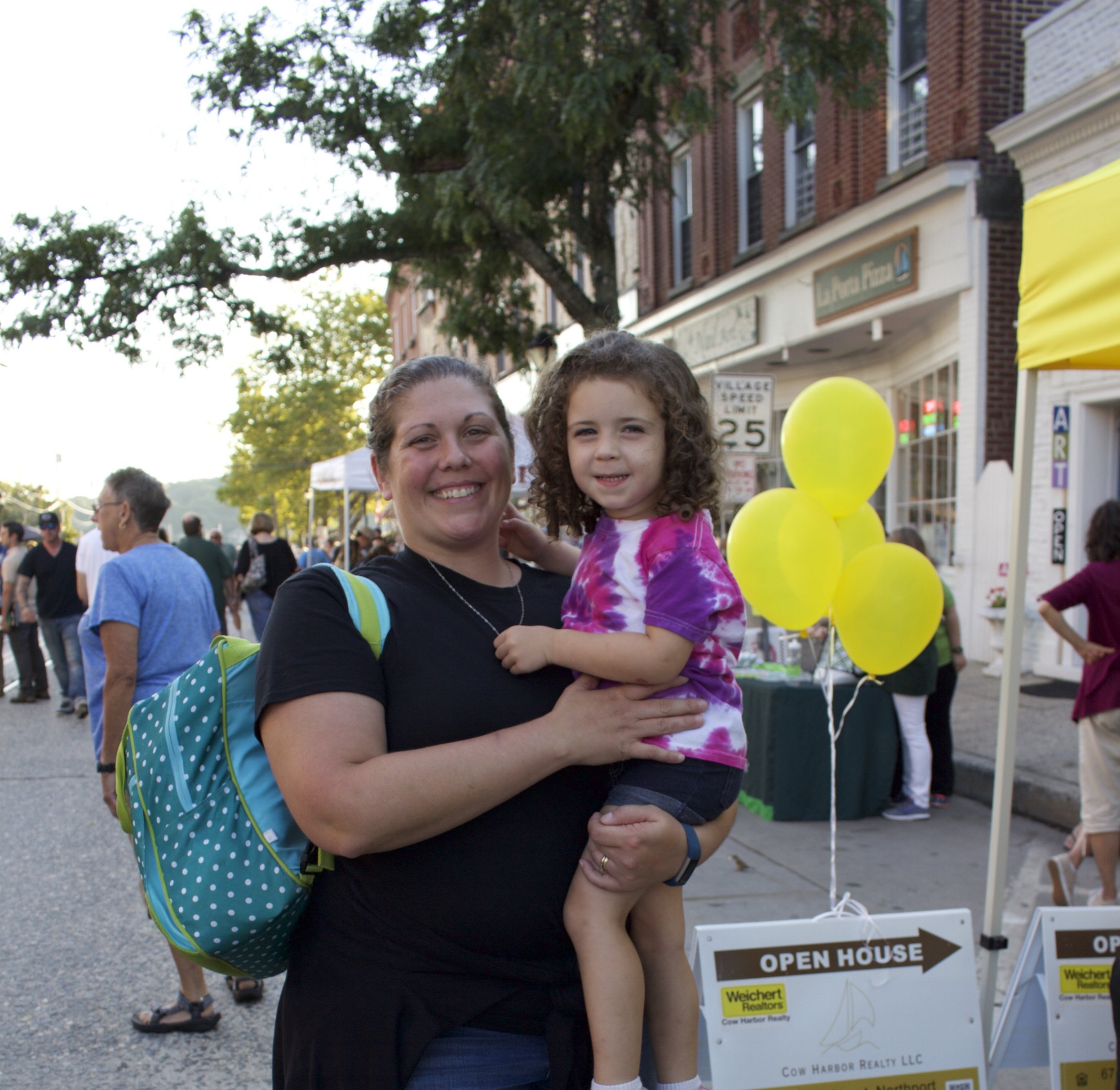  Jenn and Jackie Triquet, of Huntington, are all smiles. 