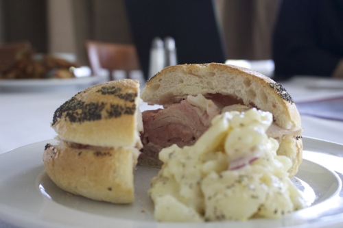  The fresh ham club sandwich ($10), offered every Thursday on the grill menu, is served on a Kaiser roll. 