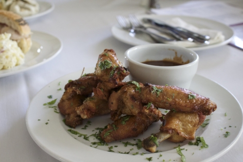  Crispy Jamaican Jerk Wings ($9) are juicy and packed with flavor. 