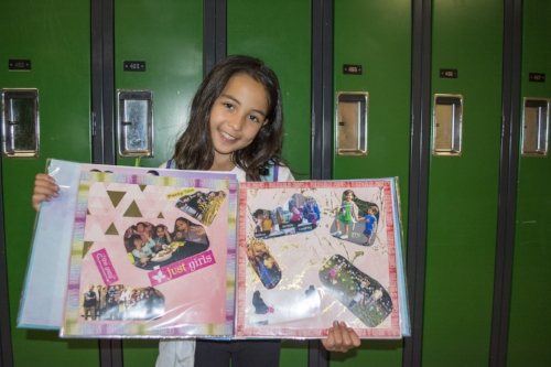  Eliana Herskovitz, 8 years old, displays her favorite page from her new scrapbook. 