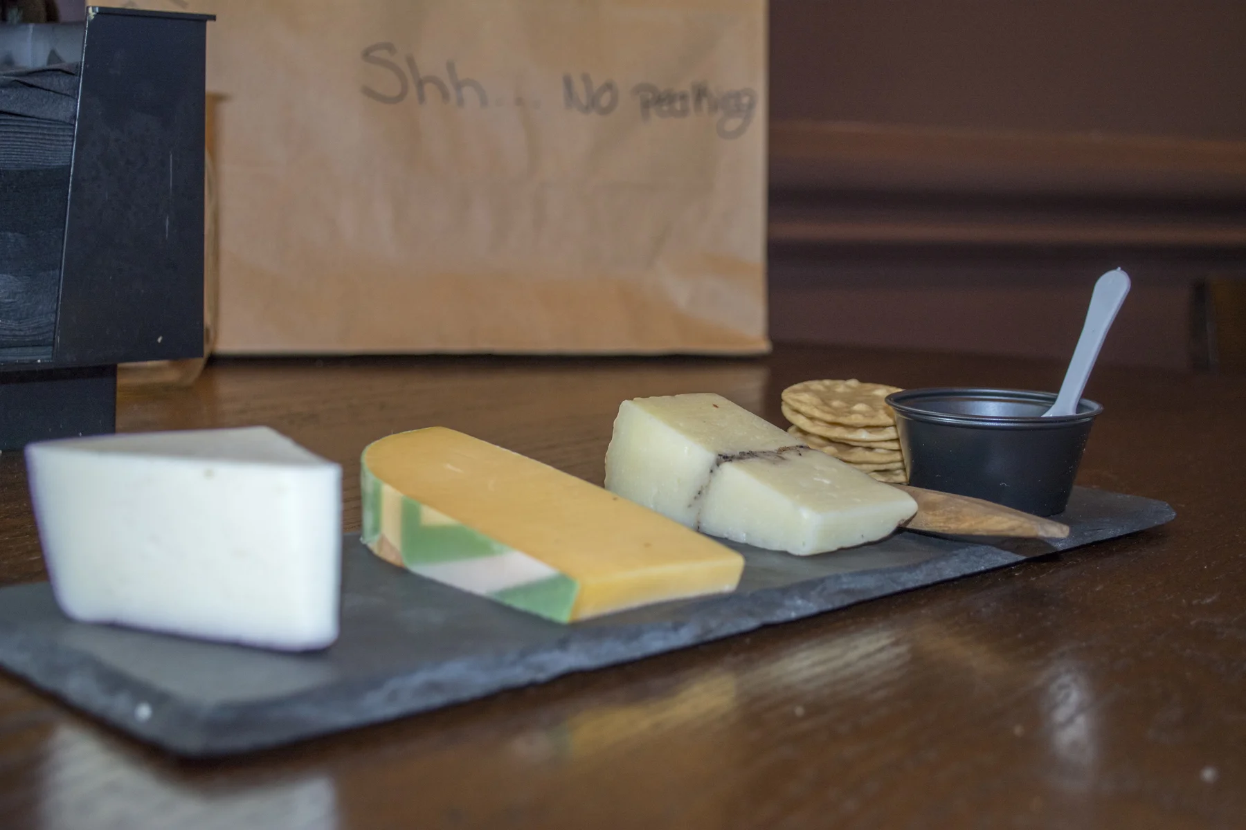   The Cheese Board ($18) features, from left, a red wine goat cheese, a yellow Gouda and a sheep’s milk cheese with truffle.   Long Islander News photos/Barbara Fiore  