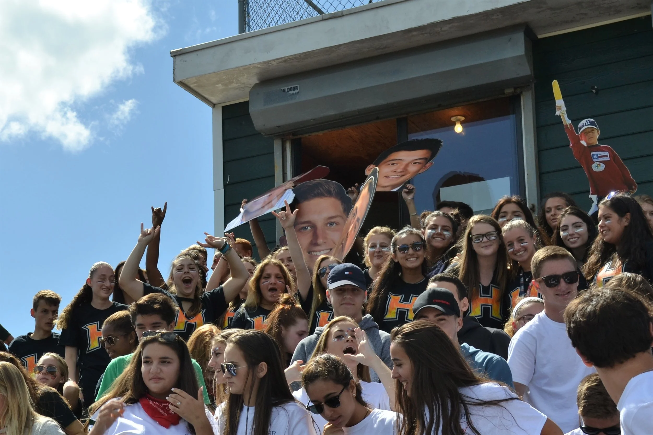   Harborfields High Schoolers cheered for the football team during Saturday’s homecoming game.   Photos/Harborfields Central School District  