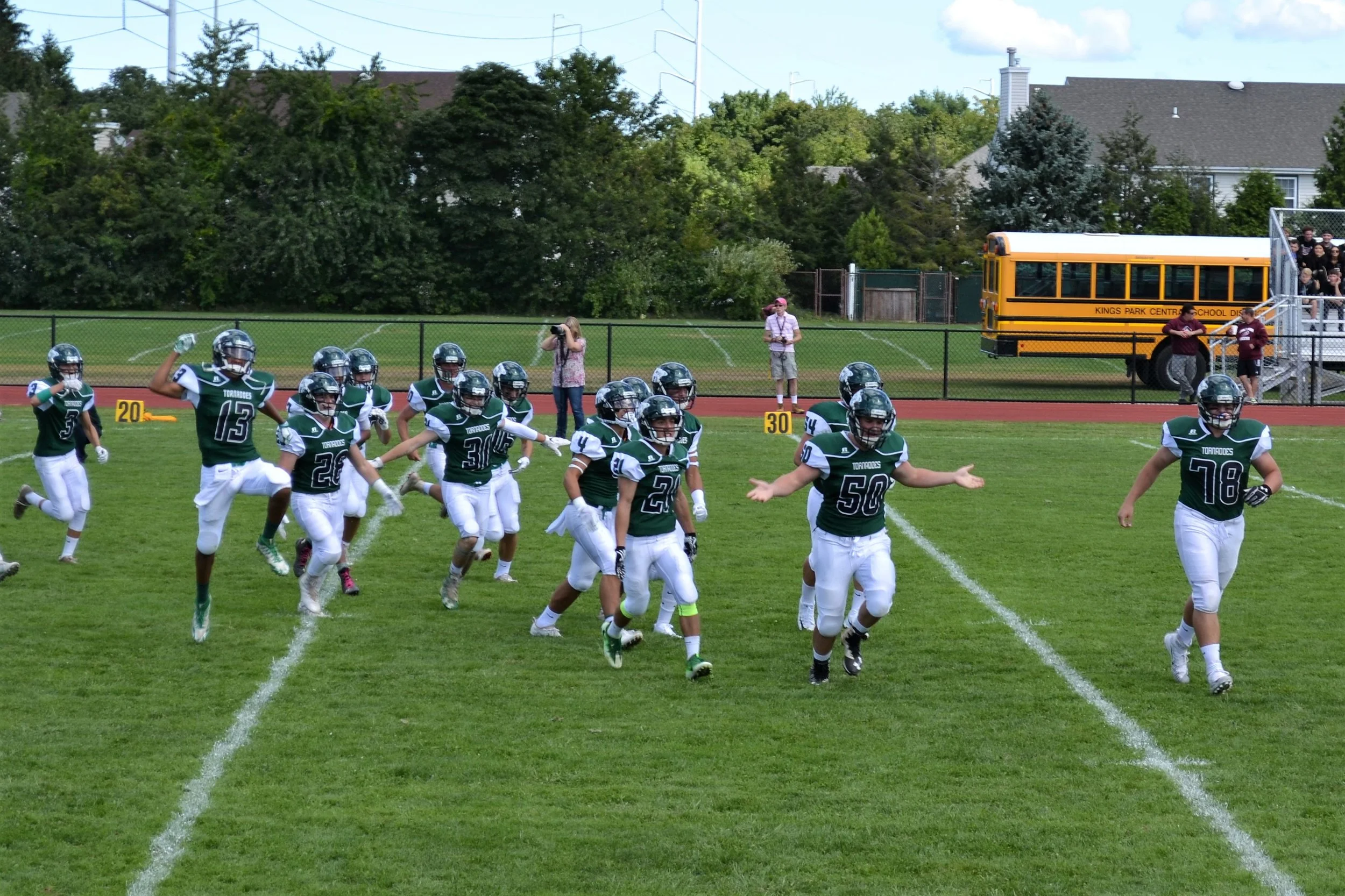   The Harborfields Tornadoes ran onto the field during their homecoming game.   Photos/Harborfields Central School District  
