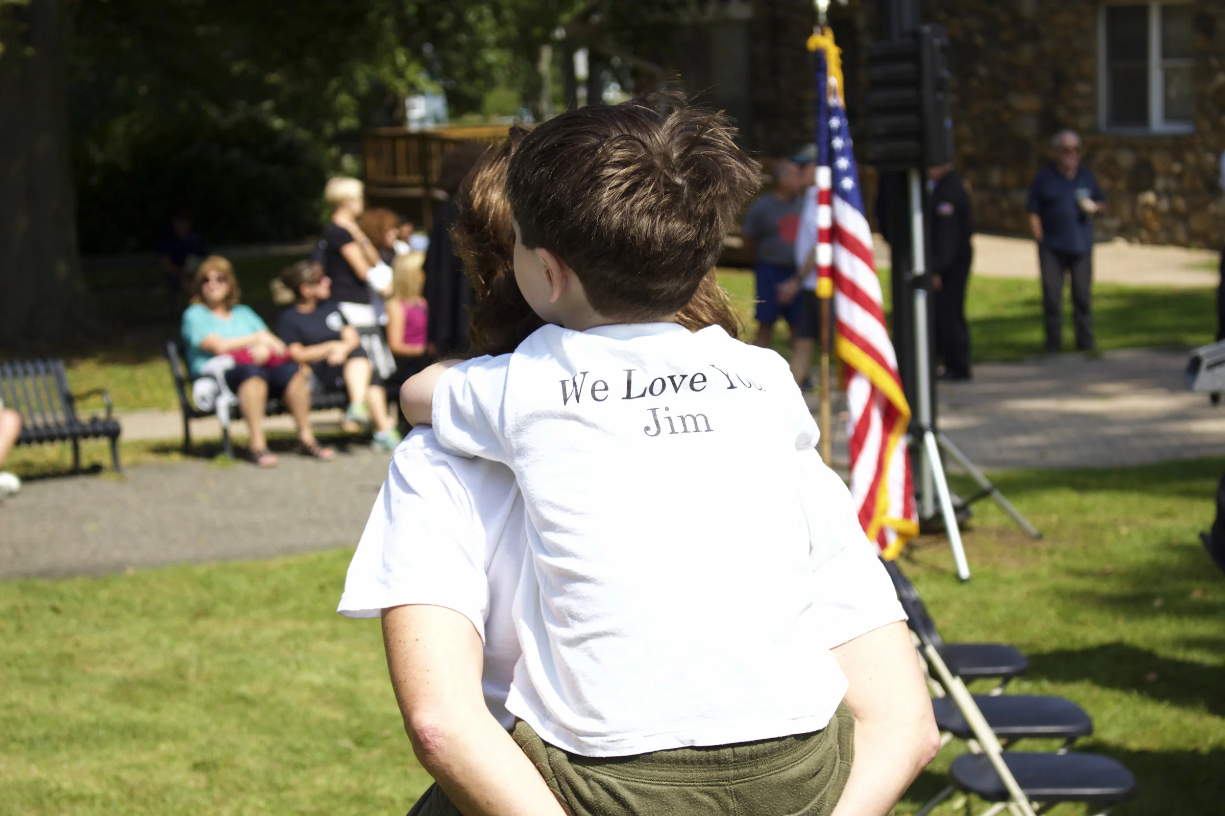   Family members and friends of the James Brian Reilly, of Huntington, who was killed on 9/11 in the south tower, wear t-shirts that read, “We Love You Jim.”   Long Islander News photos/Janee Law  