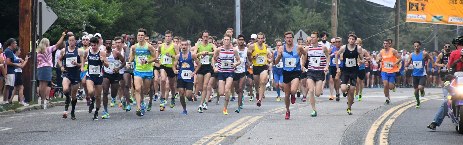   The 8:30 a.m. wave takes off on Saturday in the annual Great Cow Harbor 10K.   Photo/Ed Grenzig/Long Island Running Photos  