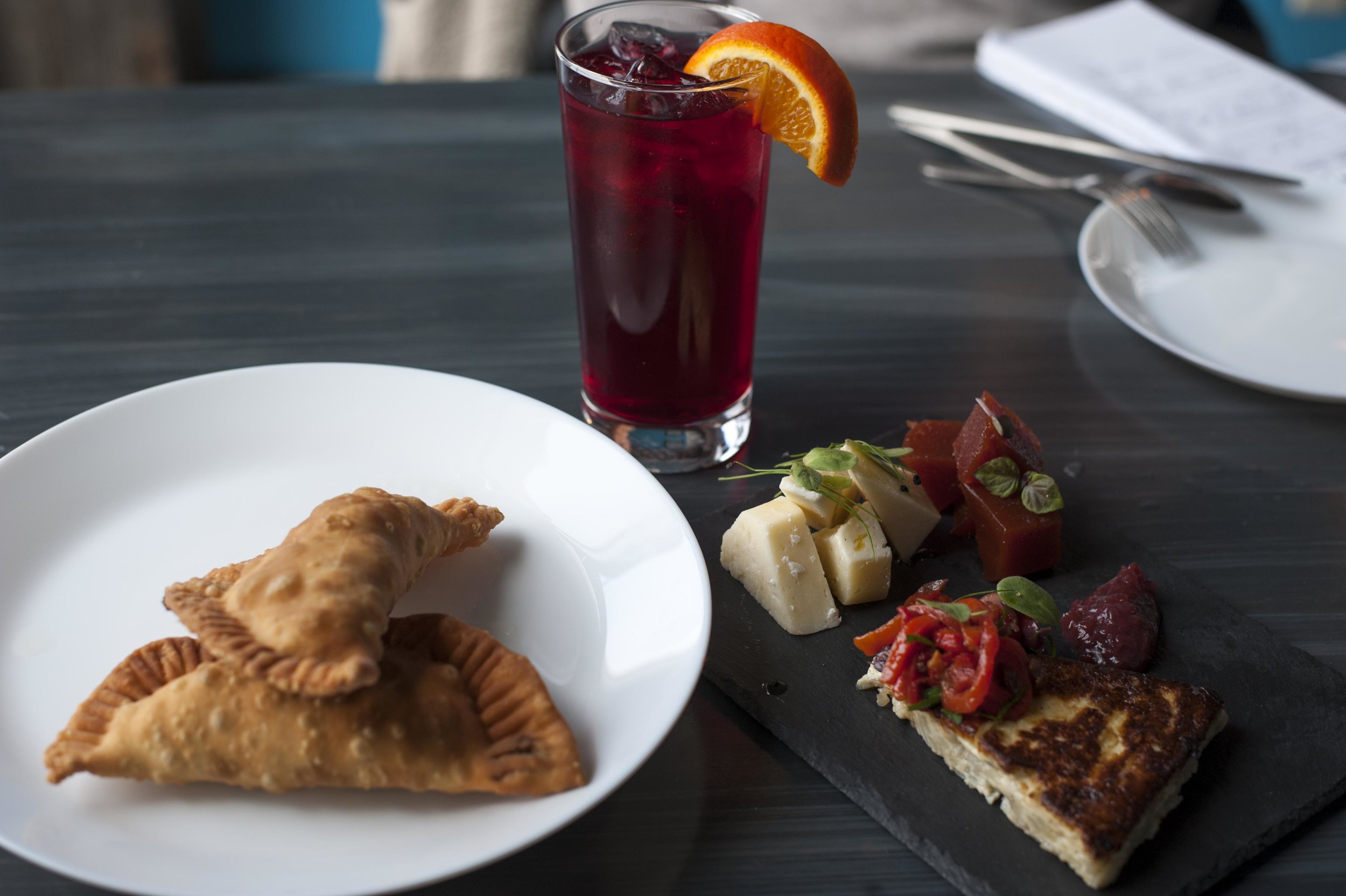   Babalu's classic baked empanadas and Guava Plate, along with a glass of non-alcoholic sangria. &nbsp; Long Islander News Photo/File  