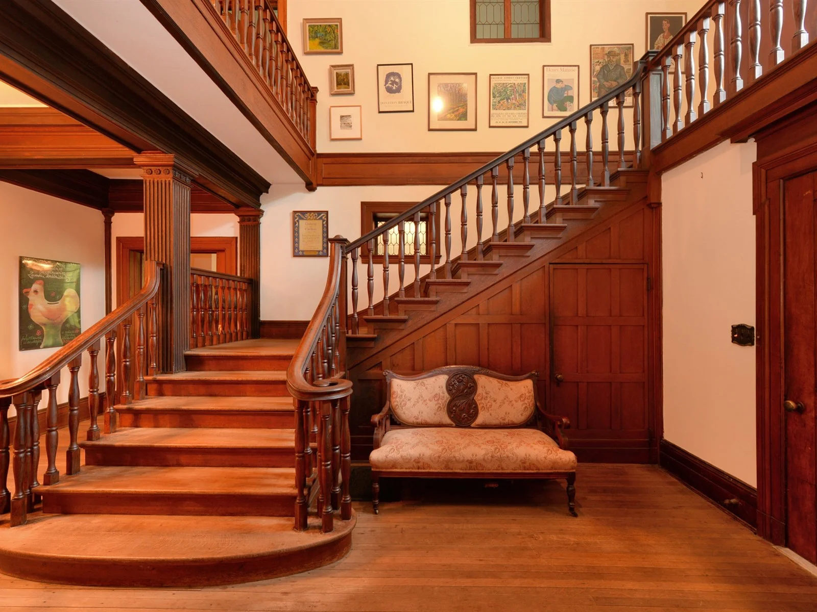   The home’s grand entrance is dominated by an original mahogany staircase.&nbsp;  Photo Courtesy of Douglas Elliman Real Estate  