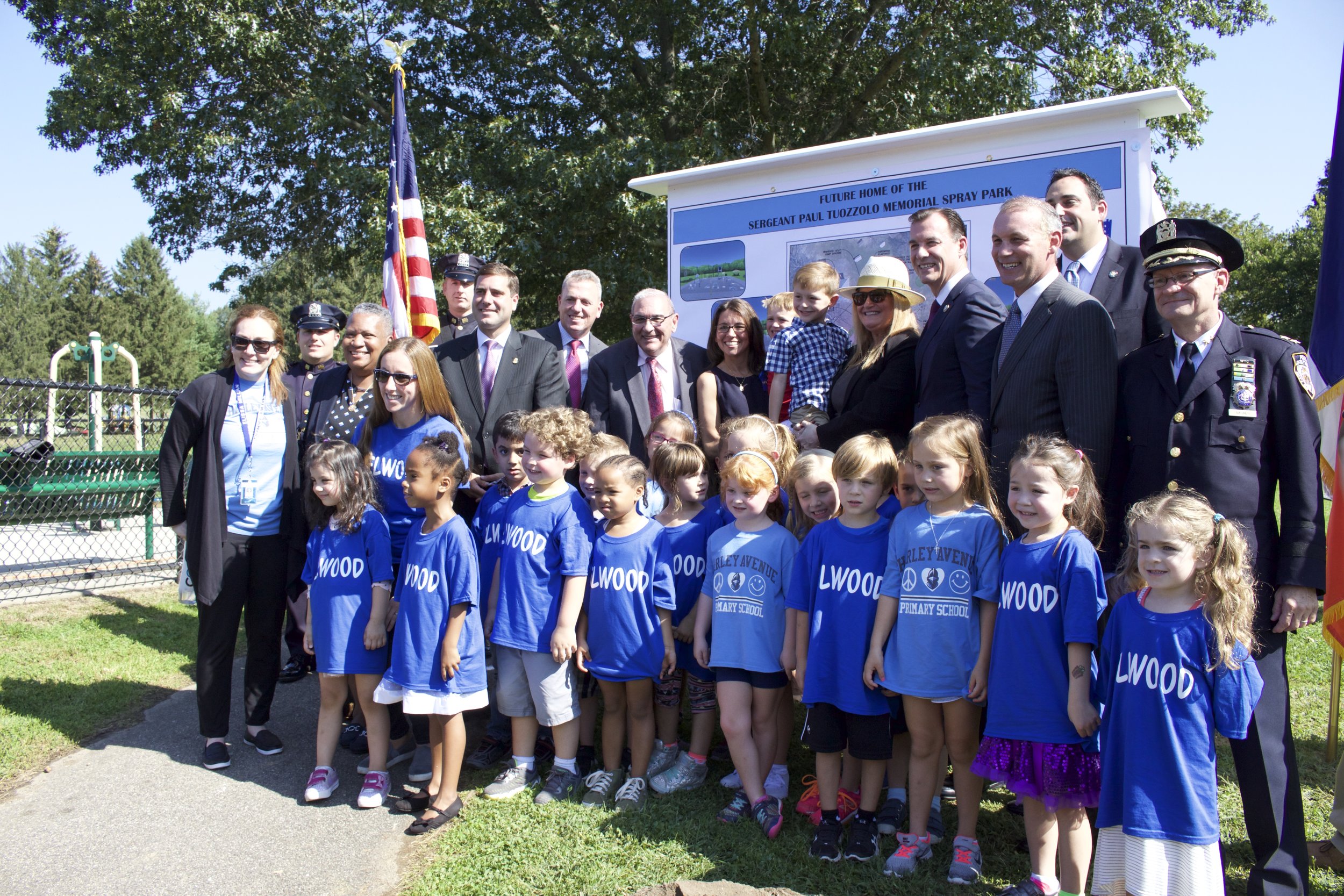   Town of Huntington officials announced plans to build a spray park at Elwood Park in memory of New York Police Department Sgt. Paul Tuozzolo.   Long Islander News photo/Janee Law  