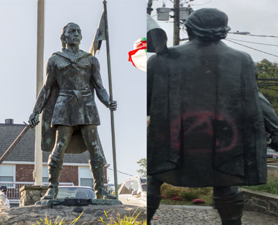   The Christopher Columbus statue in Huntington village was defaced by graffiti.   