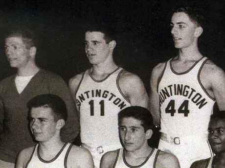   Hon. W. Gerard "Jerry" Asher, center, during his junior year campaign with Huntington’s basketball team, which ended with the Blue Devils as Suffolk champs.  