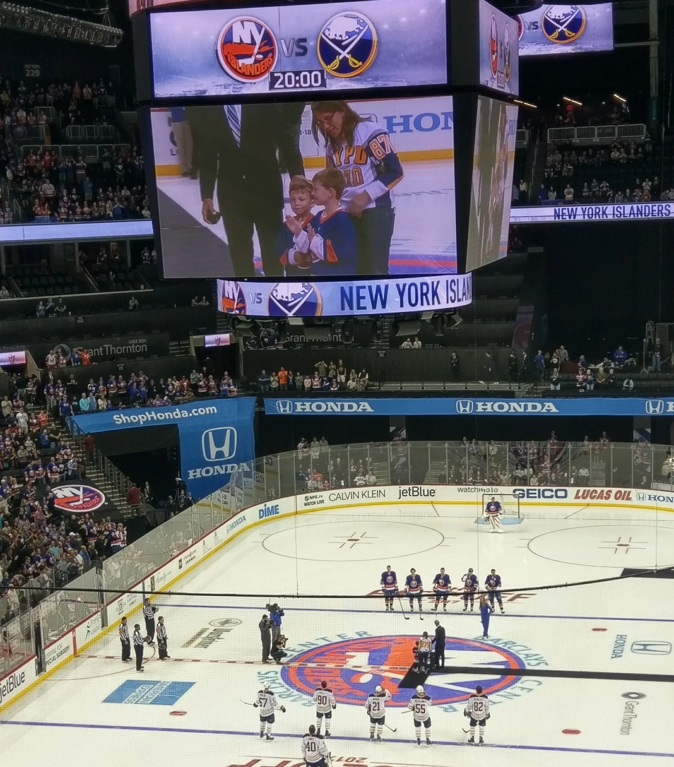 Late Cop’s Sons Help Islanders Open Season