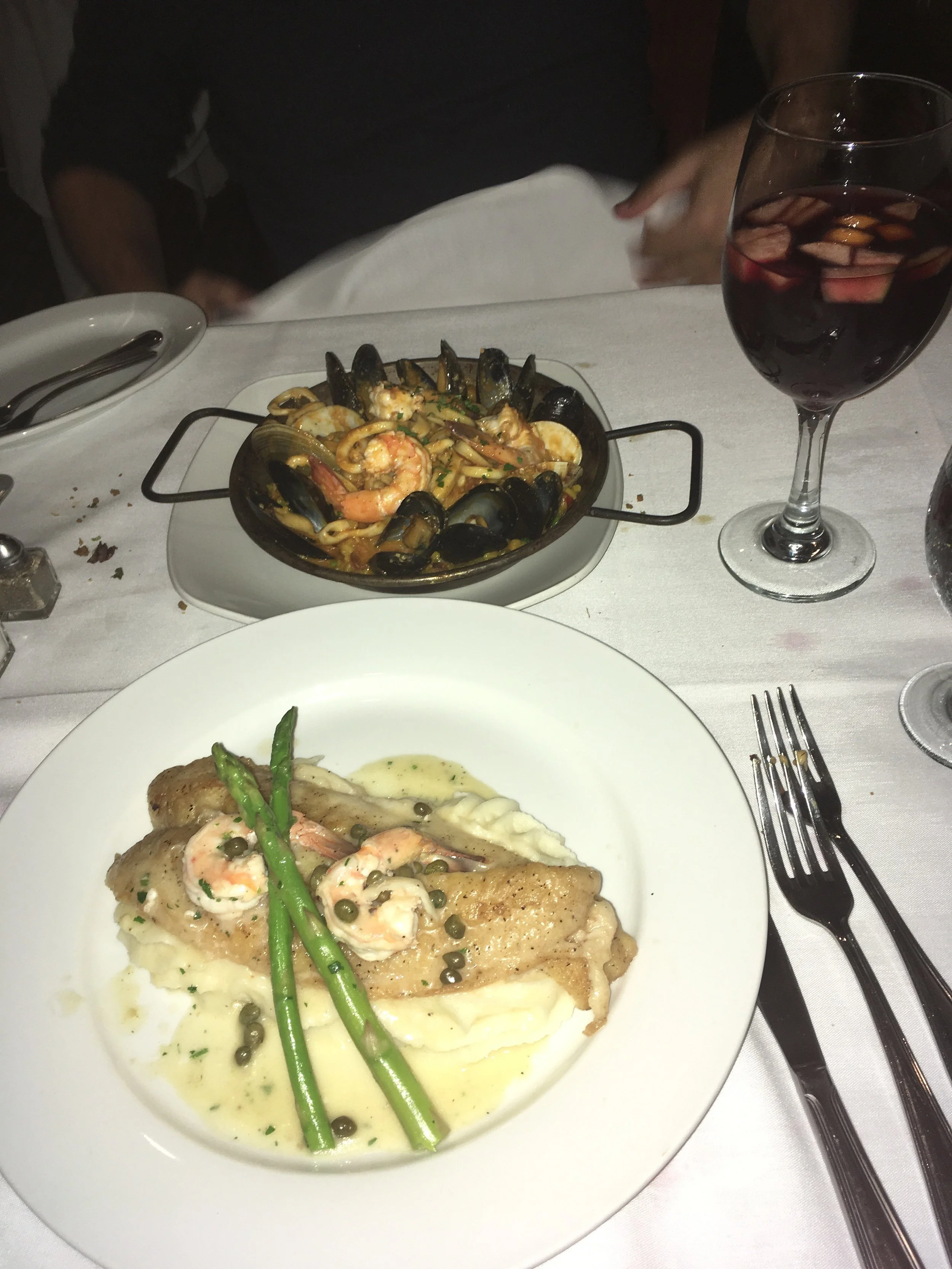   The filet of sole and shrimp, bottom, and paella, top, at Cafe Buenos Aires.   Long Islander News Photo/Paul Shapiro  