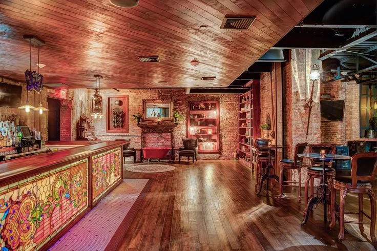   One of the many rooms within The Founder's Room that offers guests an opportunity to enjoy cocktails and small plates in comfort and style.  