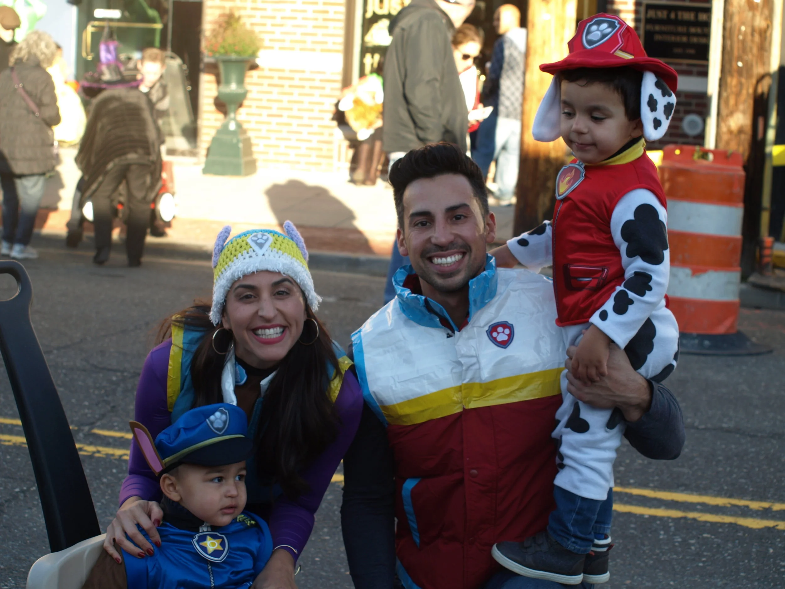  Firefighter and Police Officer were popular costumes at the Children’s Halloween Costume Parade, and this family had one of each.&nbsp;  Long Islander News Photo/Connor Beach  