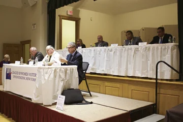 Candidates for positions in the Suffolk Legislature are pictured, front row, from left: Thomas Donnelly; Robert Schuon and Michael Troetti; and back row, from left: Susan Berland; Hector Gavilla; William “Doc” Spencer; and Dominic Spada. Long Islander News Photo/Janee Law