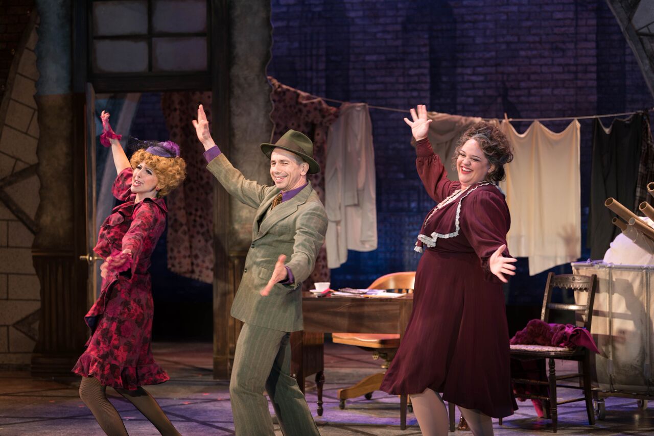   Gina Milo (as Lily St. Regis), Jon Peterson (as Rooster), and Lynn Andrews (as Miss Hannigan) during a performance of “Easy Street.”   Photo by Michael DeCristofaro  