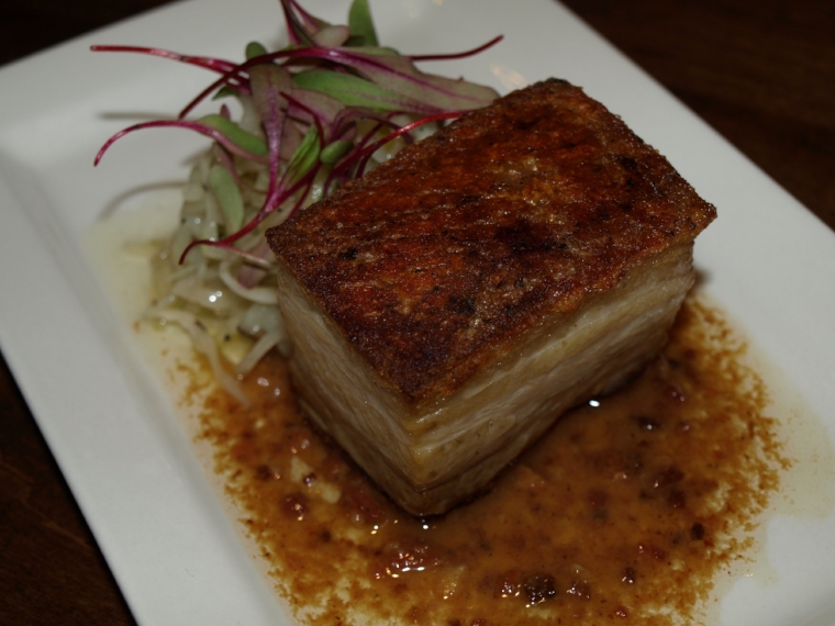   The Berkshire Pork Belly ($15) is served with a cabbage and apple slaw and a maple bacon bourbon vinaigrette. &nbsp; Long Islander News Photo/Connor Beach  