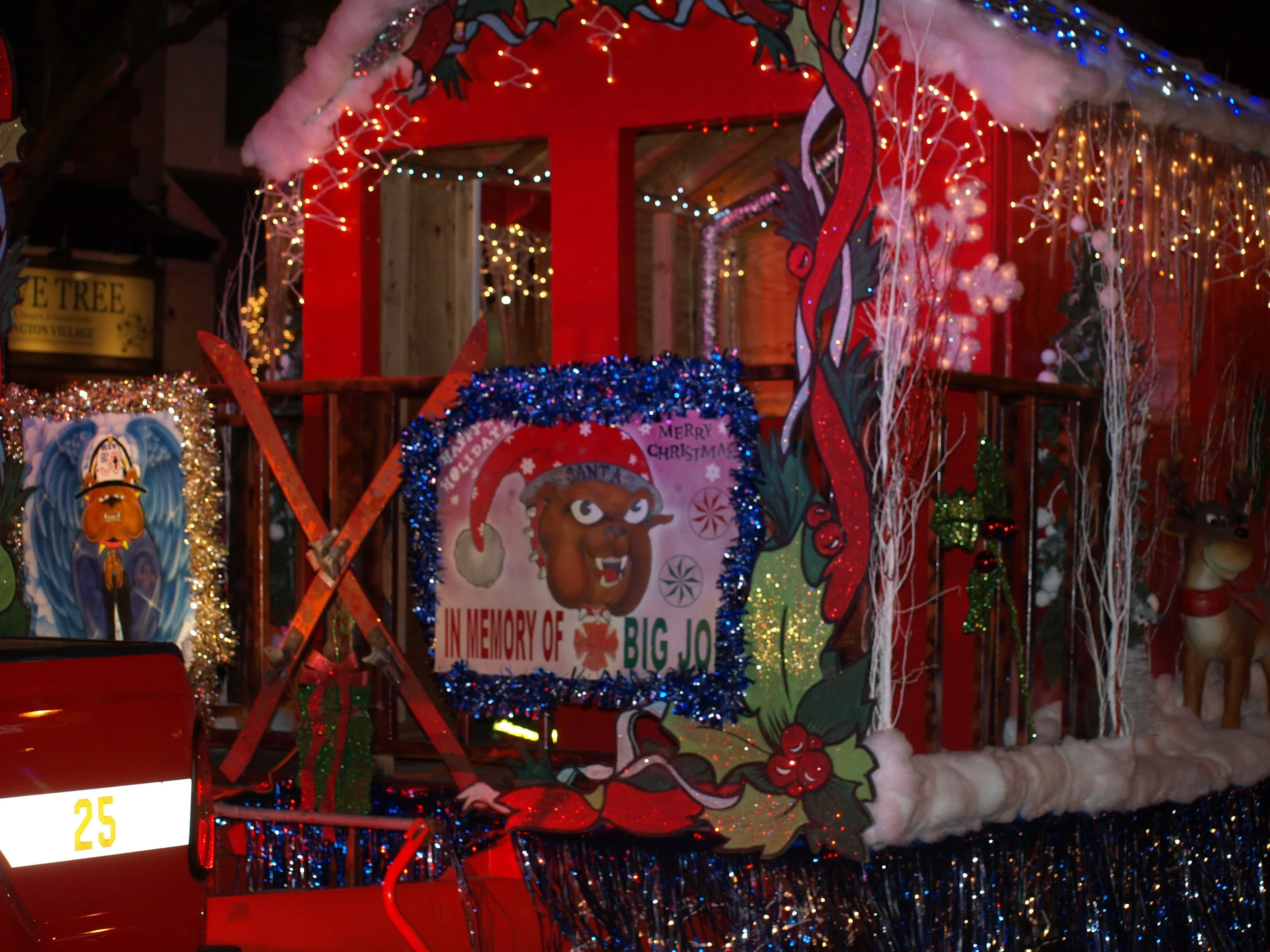   Huntington Manor Fire Department’s impressive float in the Huntington Holiday Parade.   Long Islander News Photo/Connor Beach  