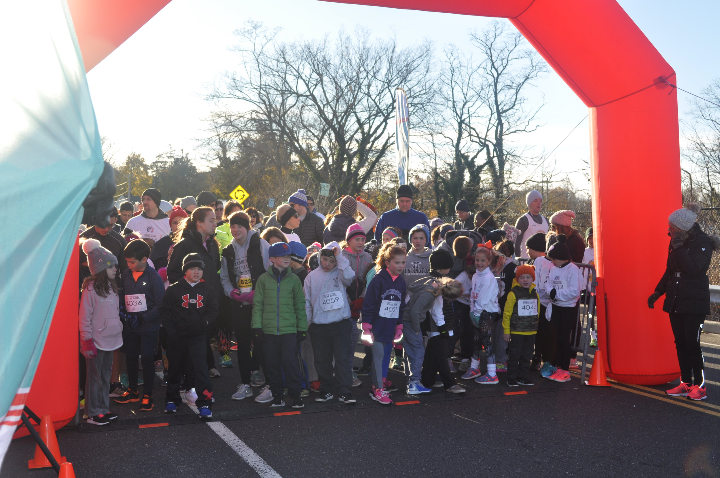 Runners prepare to pound the pavement at the Townwide Fund’s Annual Thanksgiving Day Charity Run. Photo Courtesy of TWF of Huntington