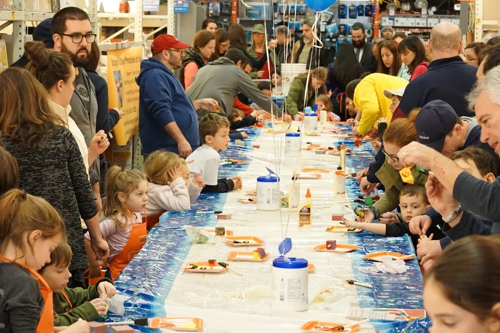   Children worked on their dreidels during the Chabad of Huntington Village’s workshop at The Home Depot.   Photo Courtesy of Chabad of Huntington Village  