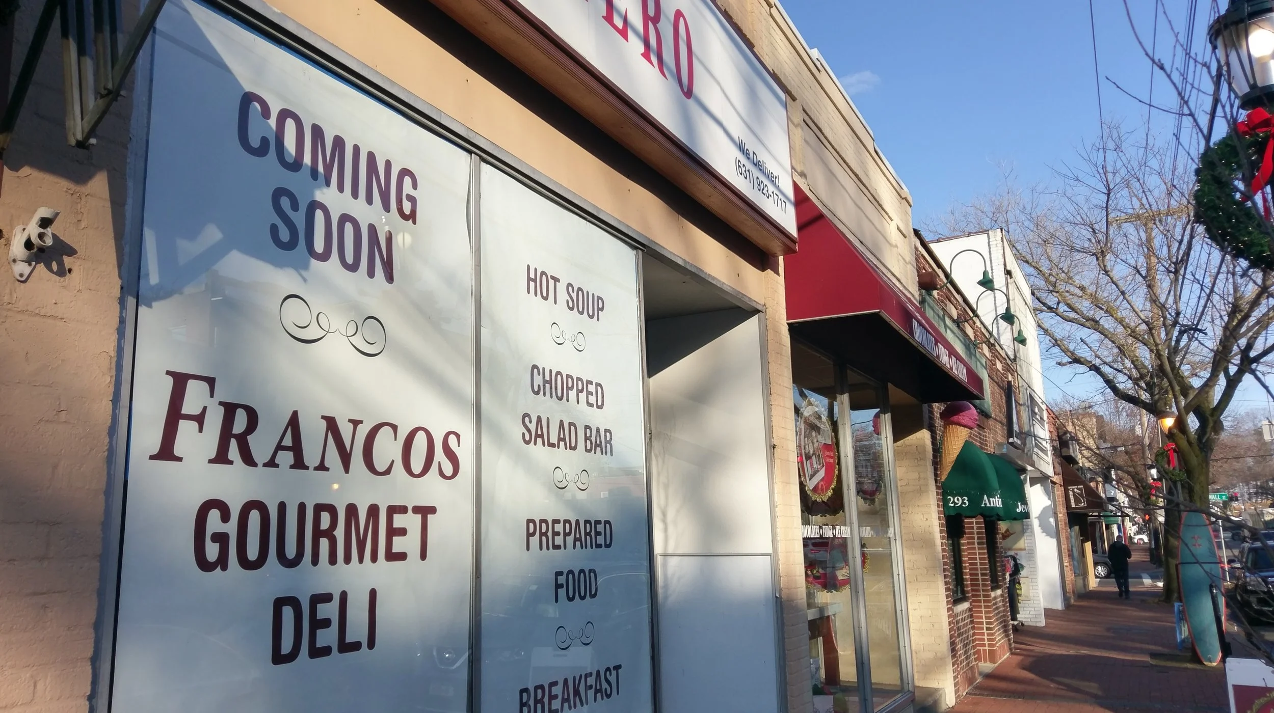 A sign for Francos Gourmet Deli has been posted on the 295 Main St. storefront in Huntington village. Long Islander News photo/Andrew Wroblewski