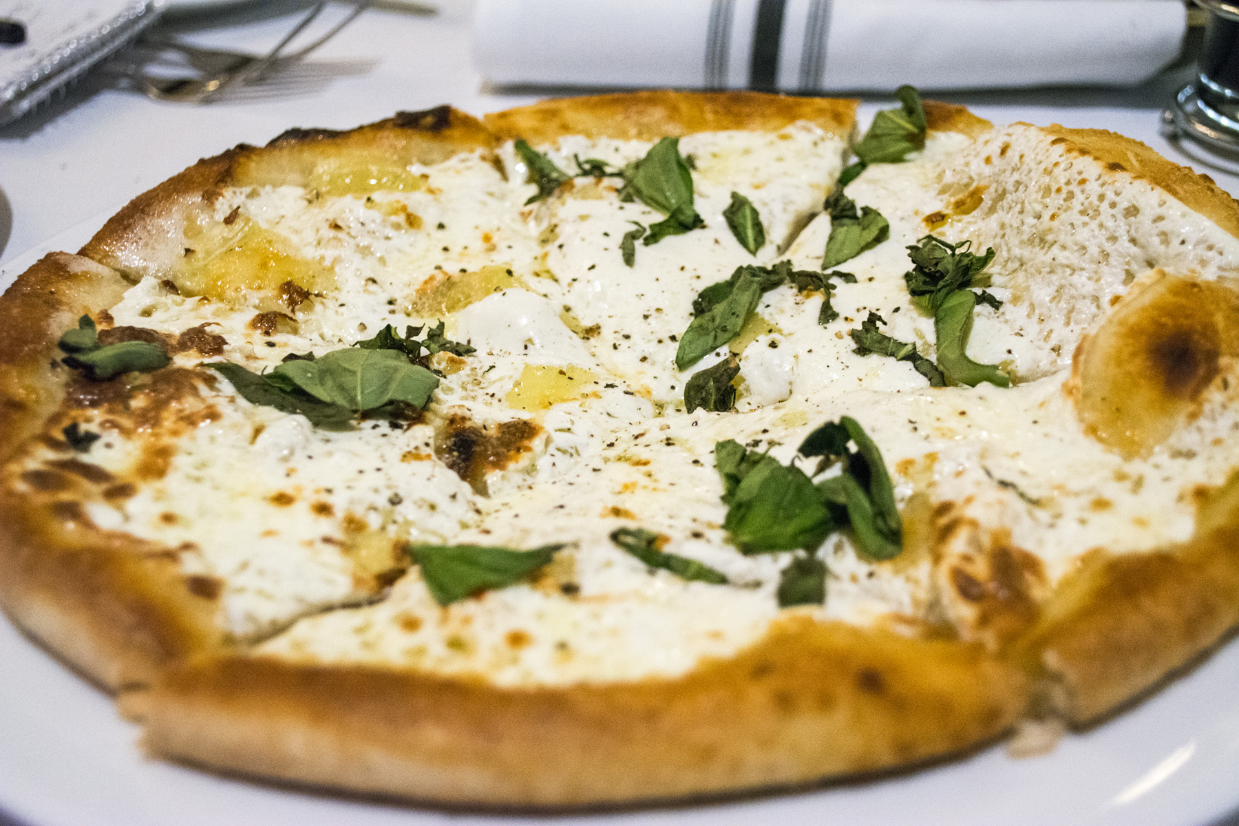   The Robiola Pizza ($18.50) features robiola cheese, mozzarella, basil and truffle oil.   Long Islander News photos/Barbara Fiore  