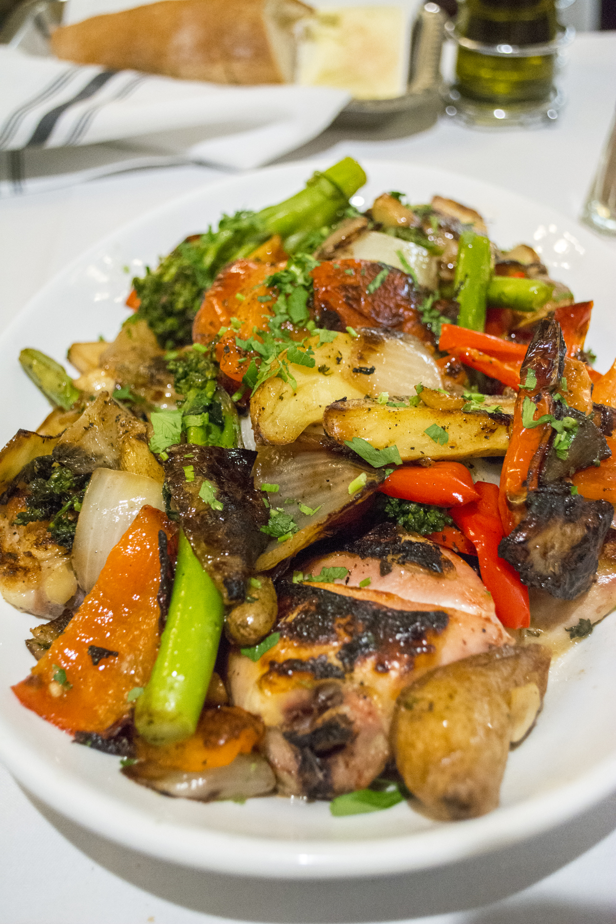   The Chicken Matteo ($26/$39) is served with a heaping portion of sausage, onions, peppers, broccolini and potatoes .  Long Islander News photos/Barbara Fiore  