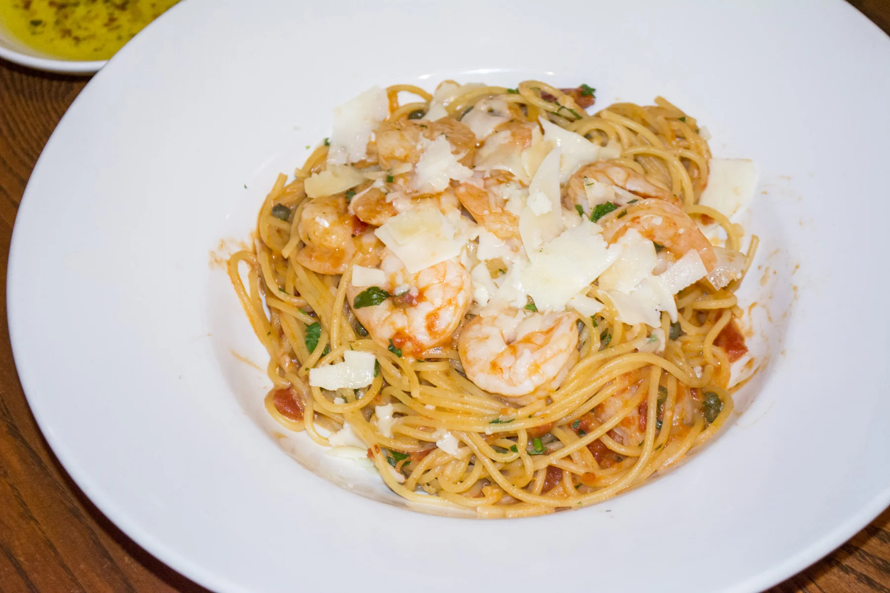   The Shrimp Rossini ($16.99) features sautéed shrimp served over spaghetti in a tomato cream sauce with capers.   Long Islander News photos/Connor Beach     
