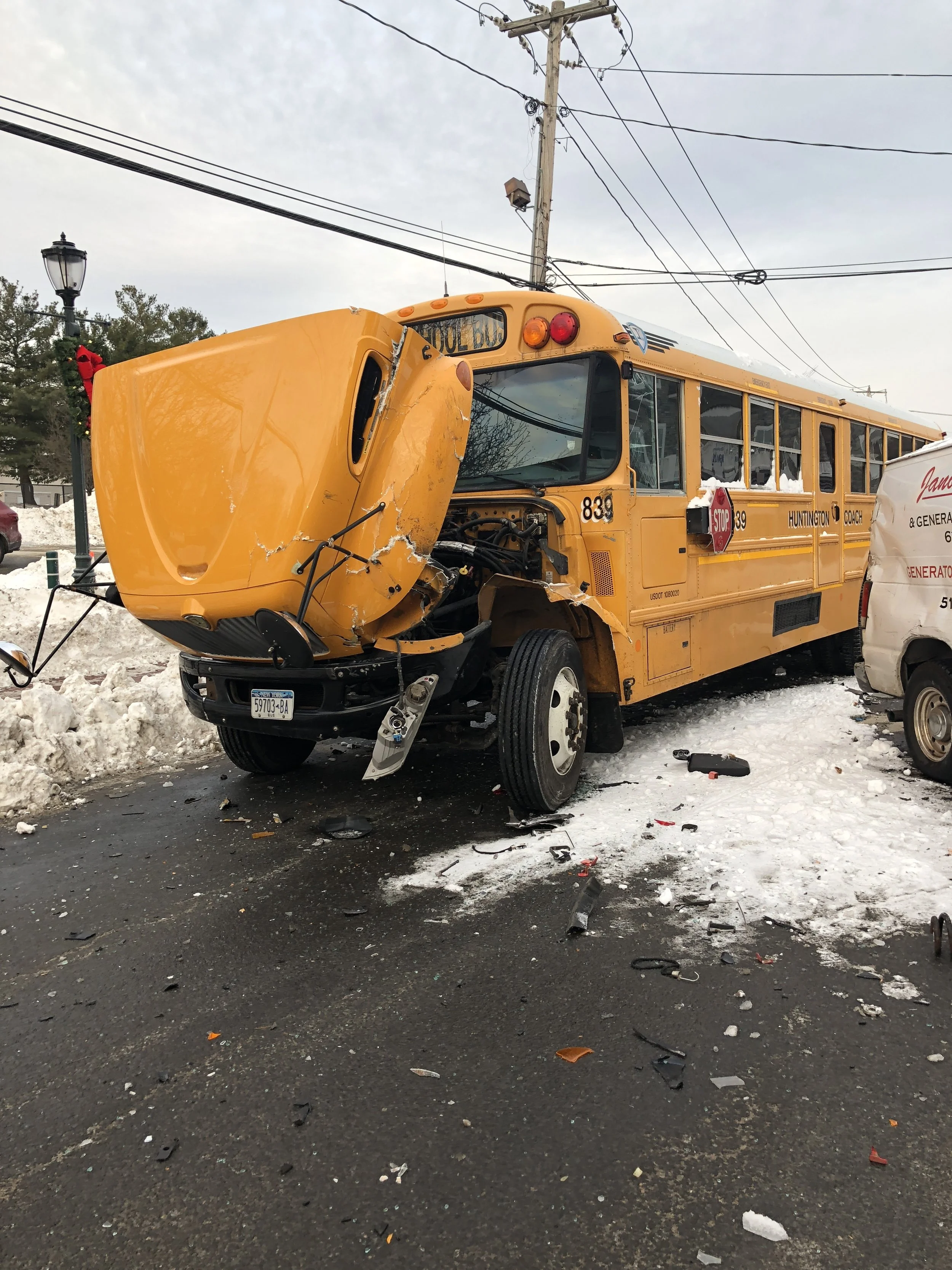   The scene in Huntington on Monday, when a three-vehicle crash involving a school bus occurred around 7:45 a.m   Photos/First Aid Squad  
