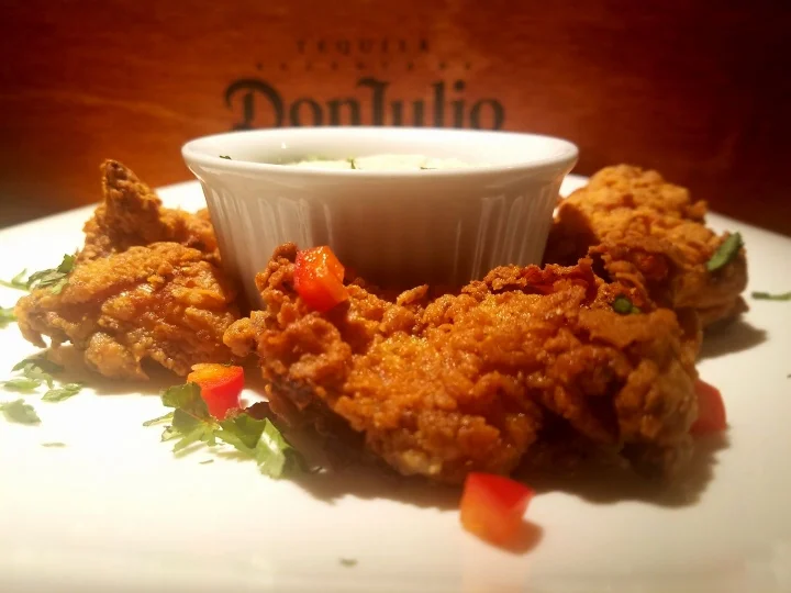 ArToro’s Chicharron De Pollo, traditional Dominican fried chicken with sofrito dipping sauce. Long Islander News photo/Andrew Wroblewski