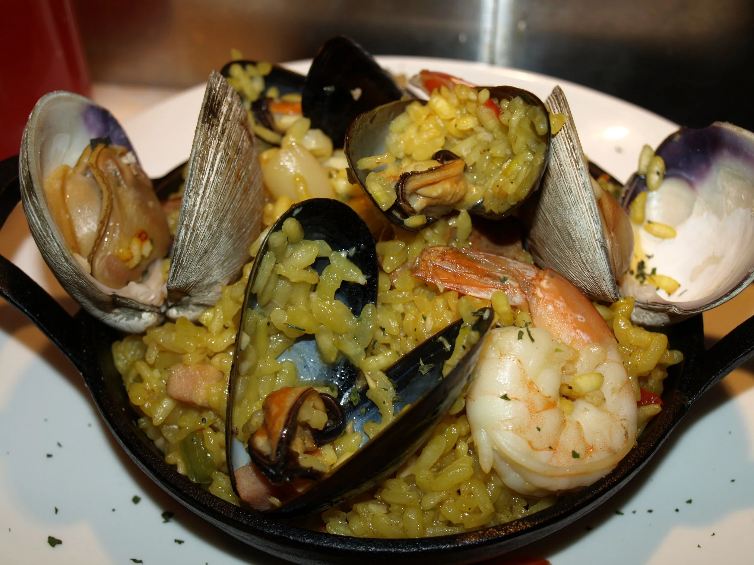   Seafood Paella ($18) with Arborio rice, chorizo, shrimp, mussels, clams and calamari, evokes images of the Carribean.     Long Islander News photos/Connor Beach     