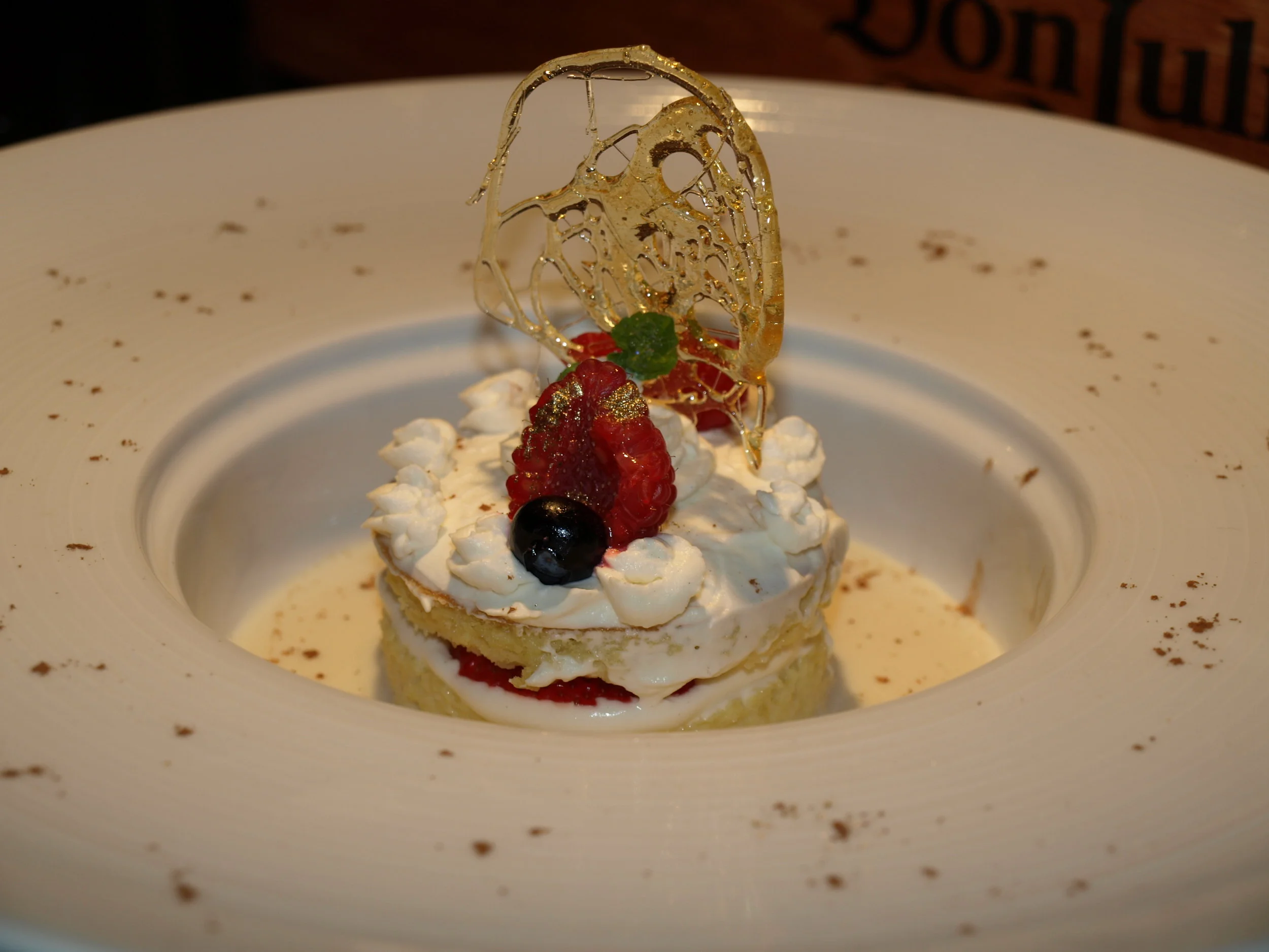   The Tres Leche Cake ($8) is a light airy sponge cake soaked in a mixture of three milks and served with strawberries.     Long Islander News photos/Connor Beach        