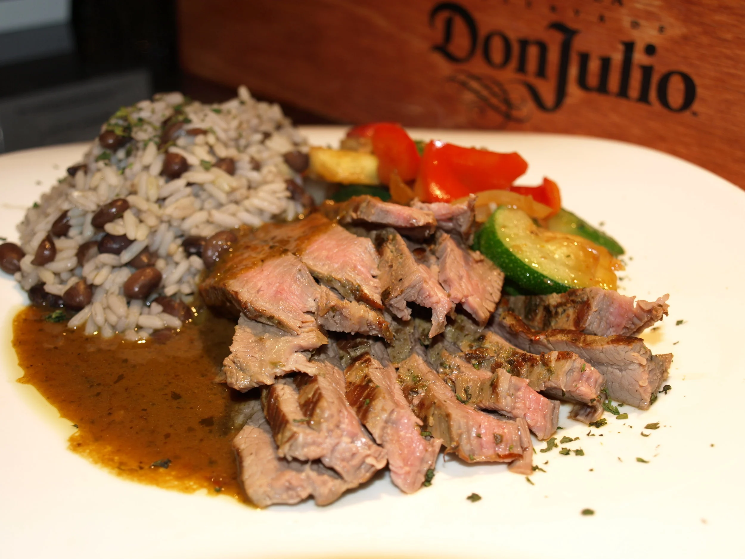   Grilled Mojo Steak ($20) features citrus marinated steak with black beans, rice and mixed vegetables.&nbsp;   Long Islander News photos/Connor Beach     