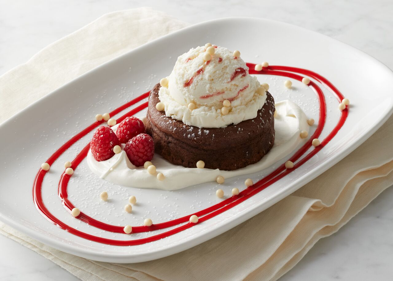 Dessert on BRIO’s Valentine’s Day menu features Molten Chocolate Cake ($7.95) with mascarpone cream and white chocolate raspberry gelato. Photo Courtesy Abbie Lipton