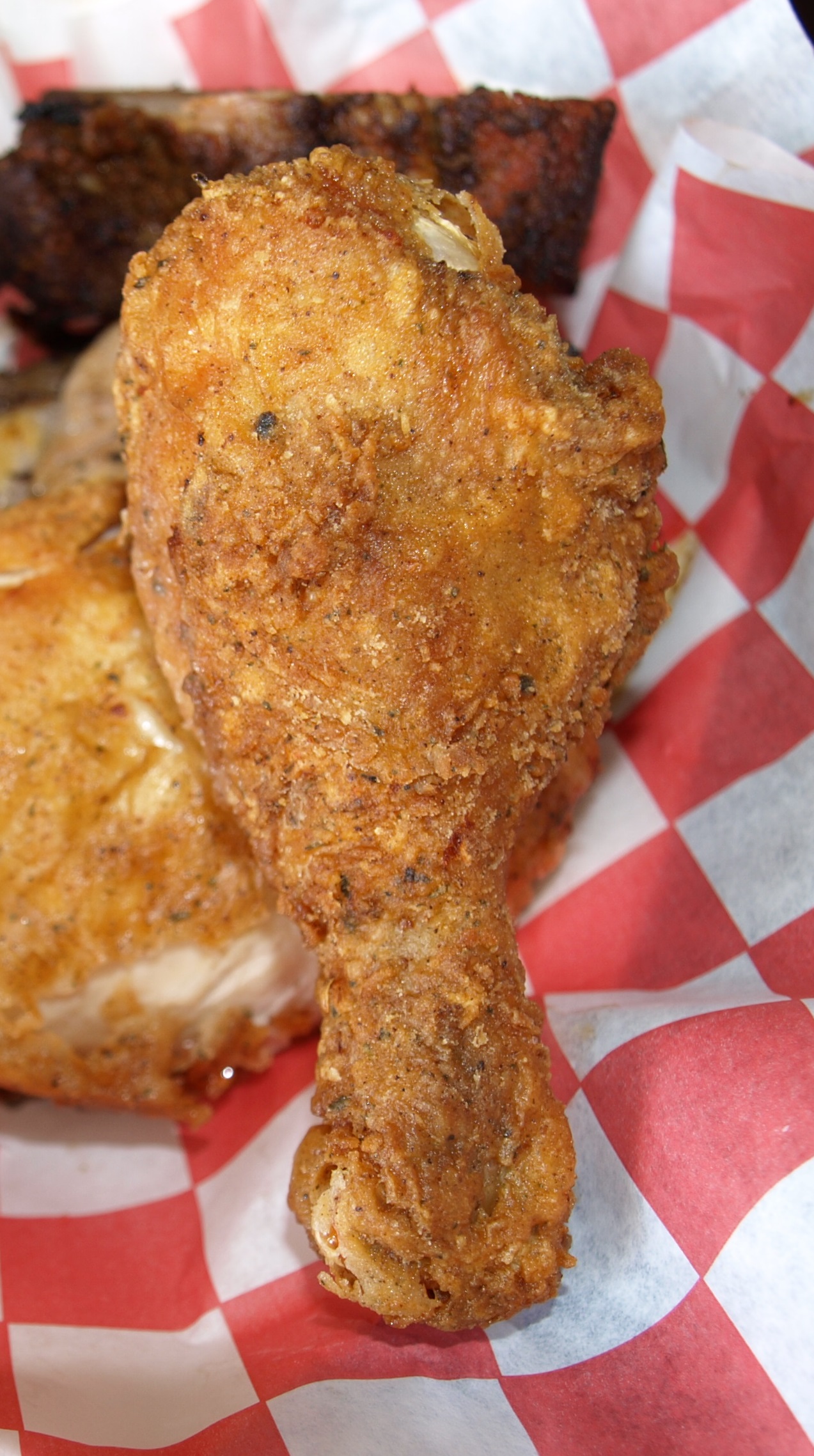   The dark meat drumstick ($7.95 for a 2-piece meal) is tender, and the spices leave a lingering kick for the taste buds .  Long Islander New photos/Connor Beach  