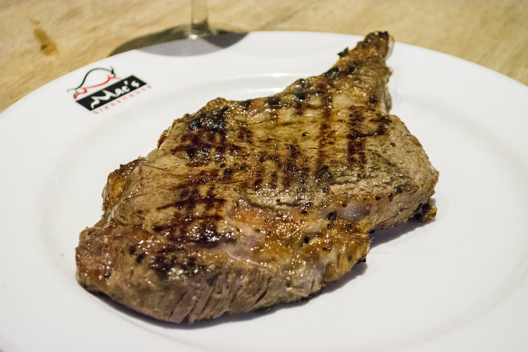 Main: The 30-day dry aged 16-ounce Bone in Ribeye ($46) is served alone on the plate in the traditional steakhouse fashion. Long Islander News photos/Barbara Fiore