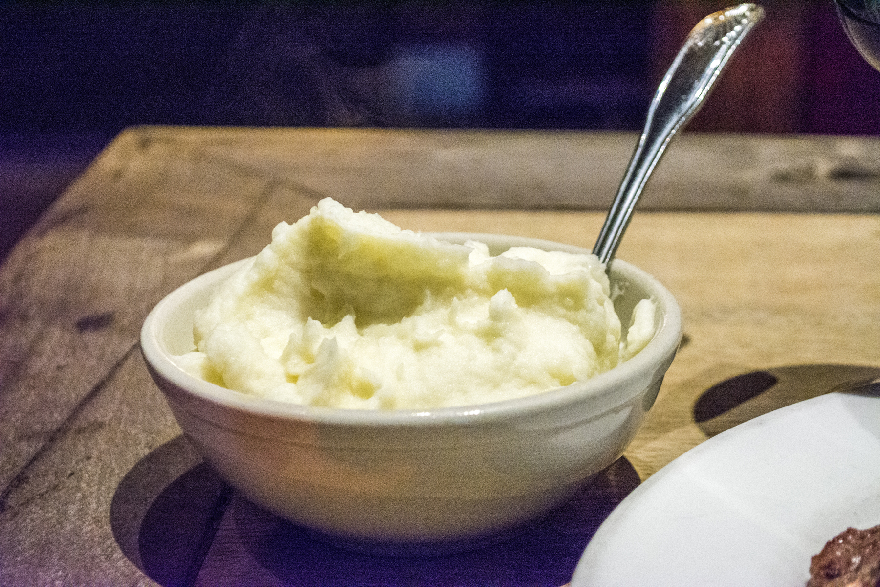 Top inset: The Garlic Mashed Potatoes ($7) are hand peeled and served as a side for any of Mac’s steaks. Long Islander News photos/Barbara Fiore