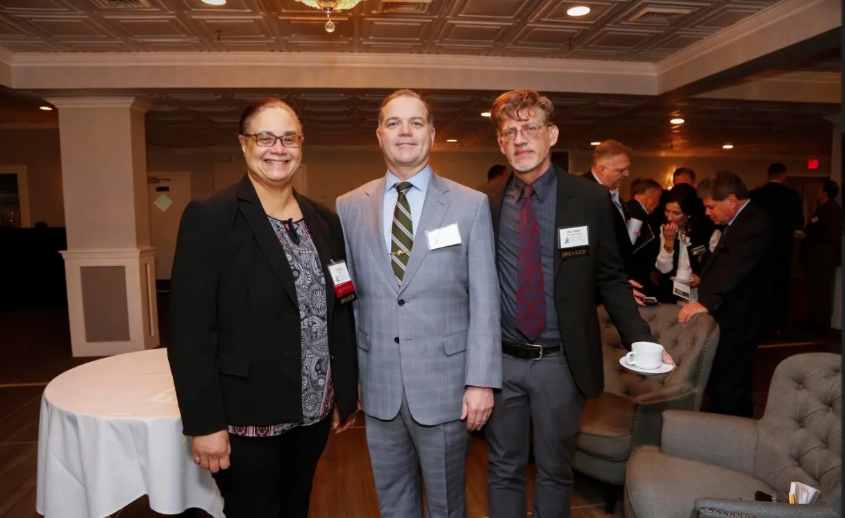   Panel moderator Joye Brown, Huntington Councilman Ed Smyth and panelist Peter Sloggatt at Huntington Chamber’s Meet the Media breakfast.   Photos/Len Marks Photography     