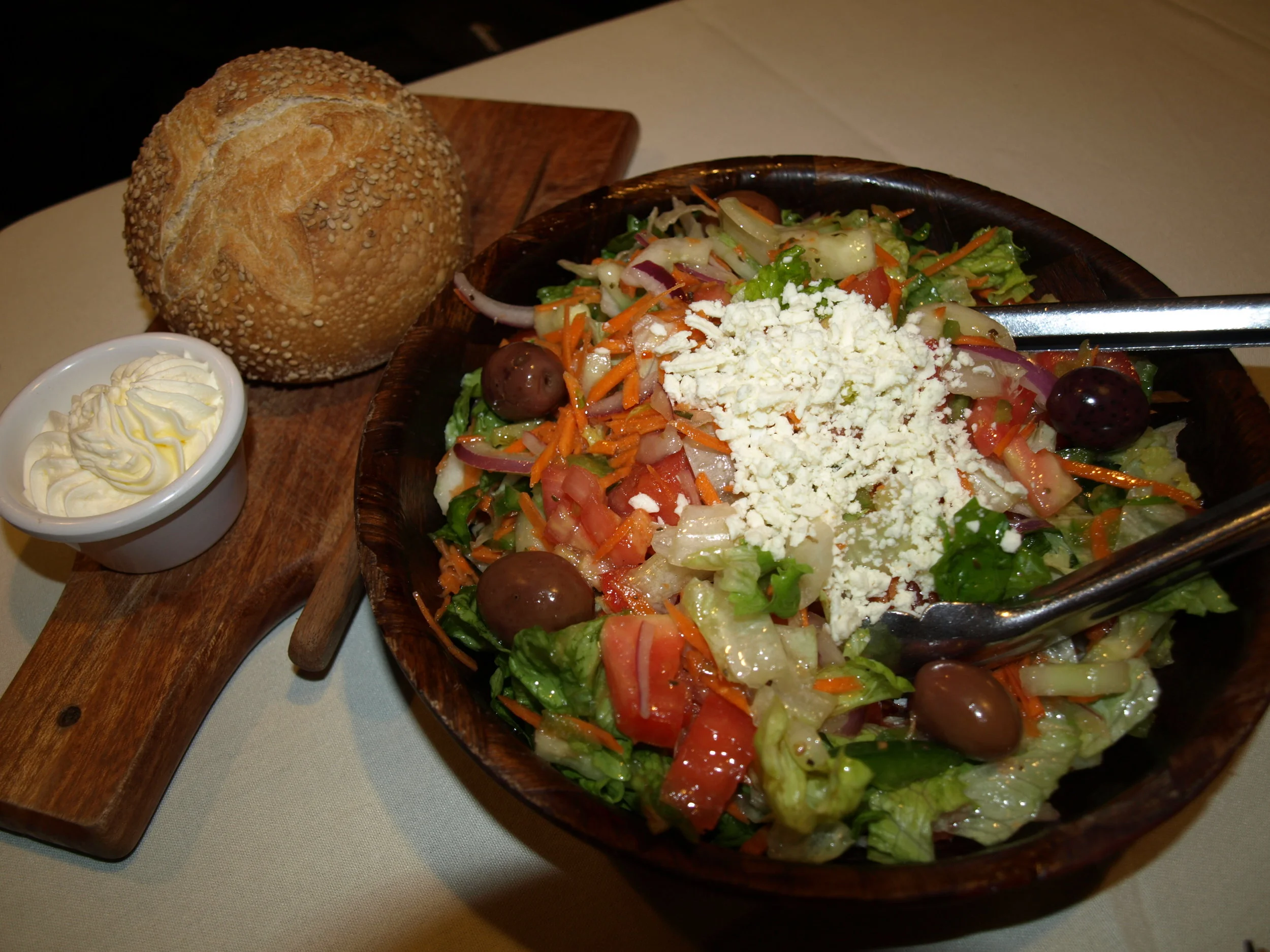   Bonwit’s signature Greek Salad ($10) and Bishops Loaf comes with every entrée and is served family style.   Long Islander News photos/Connor Beach     