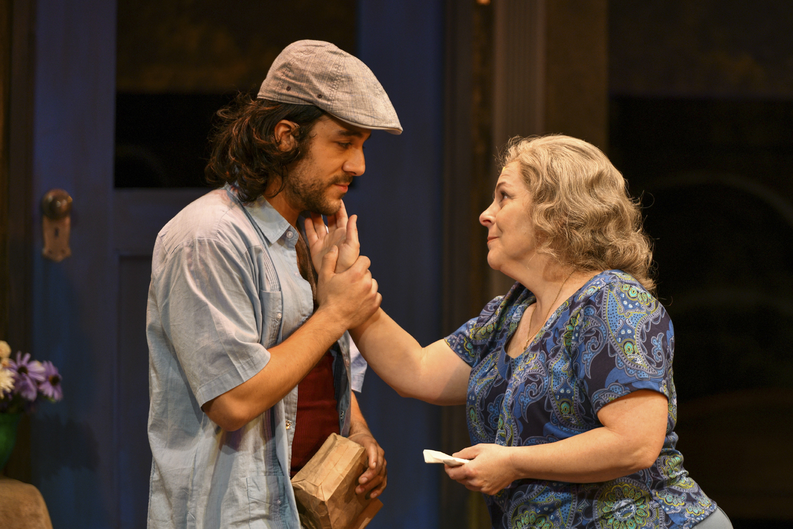   Spiro Marcos (Usnavi) and Tami Dahbura (Abuela Claudia) portray the touching relationship between mother and son.   Photos by Michael DeCristofaro  