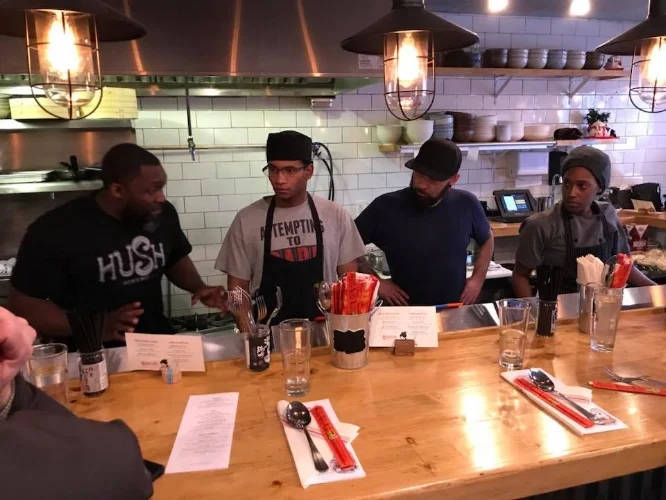 Chef Marc Anthony Bynum training staff in the art of ramen at his newly opened noodlery MB Ramen in Huntington village.
