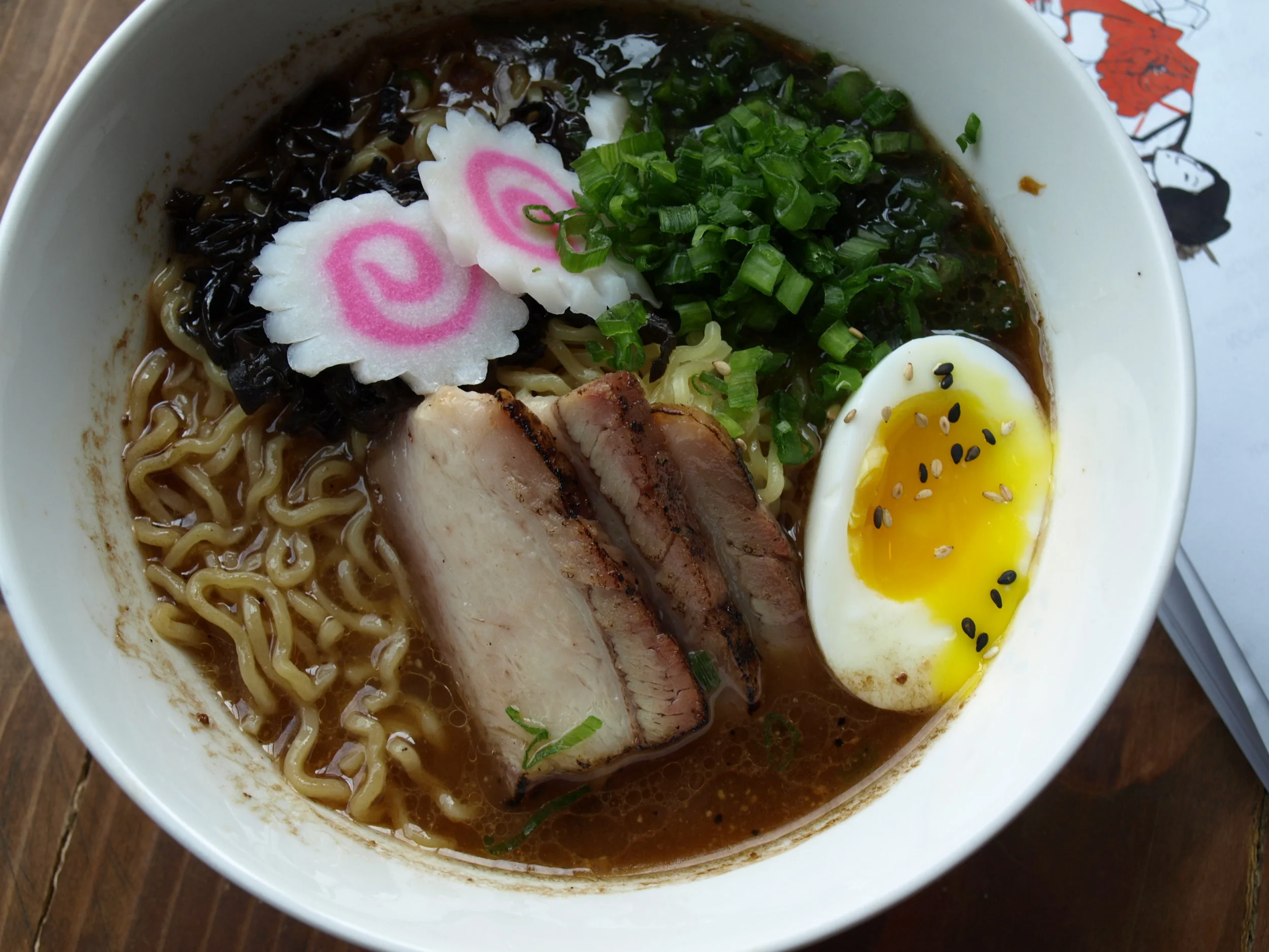  MB Ramen’s signature dish ($14) features a tonkotsu pork broth, pork belly, scallion, mushroom, pickled ginger, egg and tonkotsu noodle. 