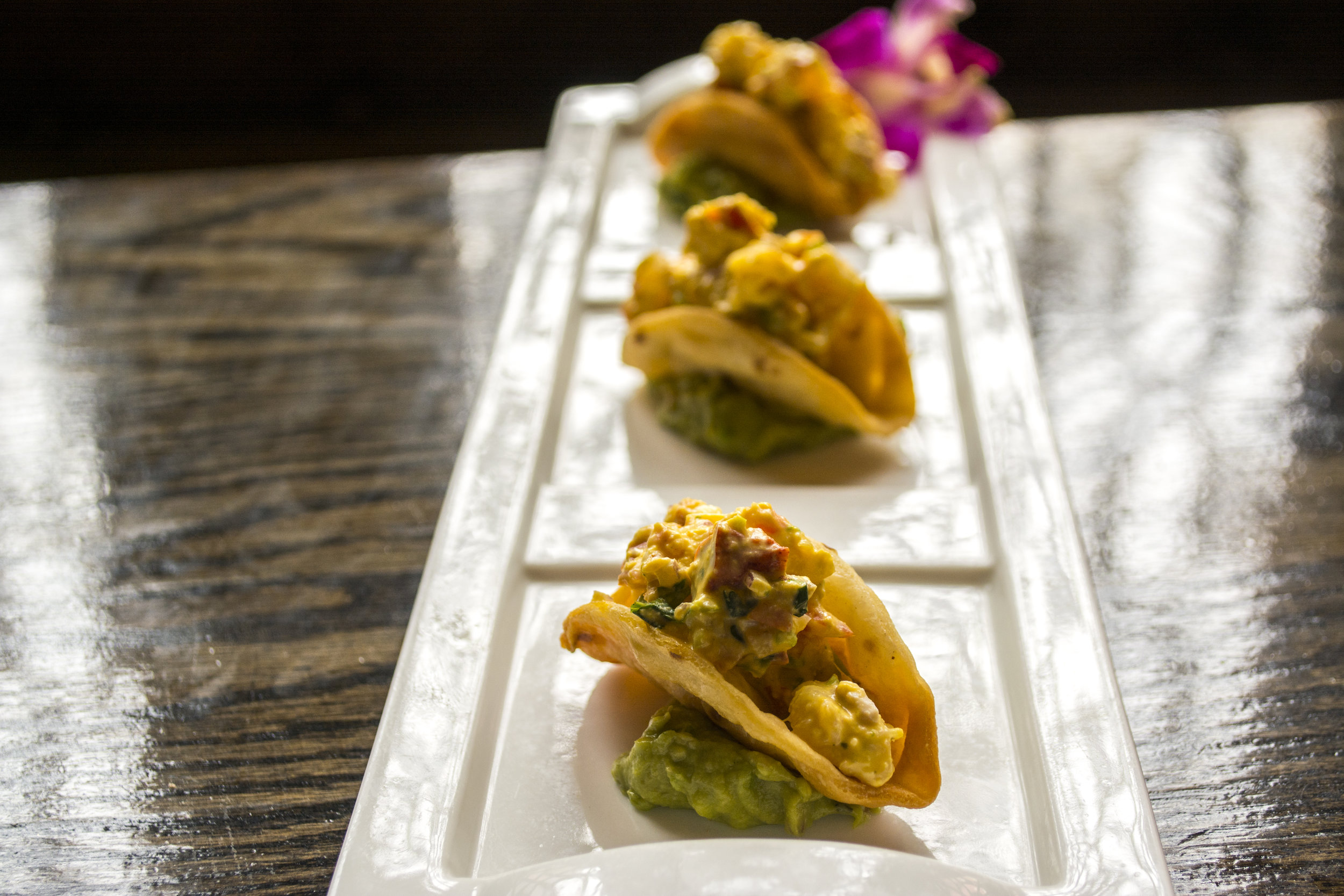   Lobster Tacos ($12)&nbsp;feature ceviche style Maine lobster, mango salsa, cilantro and jalapeno.  